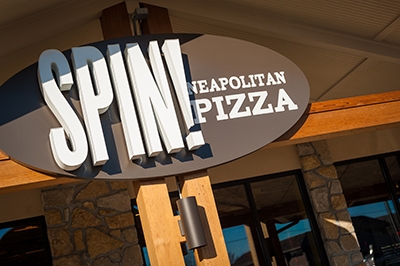 Custom Color Red SonaSpray “fc” on the ceiling in Spin Neapolitan Pizza restaurant